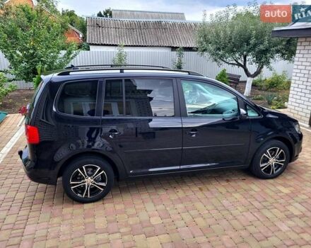 Черный Фольксваген Туран, объемом двигателя 1.6 л и пробегом 204 тыс. км за 11950 $, фото 18 на Automoto.ua