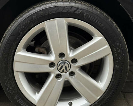 Черный Фольксваген Туран, объемом двигателя 1.4 л и пробегом 171 тыс. км за 10799 $, фото 2 на Automoto.ua