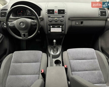 Черный Фольксваген Туран, объемом двигателя 1.4 л и пробегом 171 тыс. км за 10799 $, фото 23 на Automoto.ua