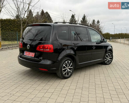 Черный Фольксваген Туран, объемом двигателя 1.6 л и пробегом 211 тыс. км за 11300 $, фото 4 на Automoto.ua