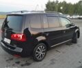Чорний Фольксваген Туран, об'ємом двигуна 2 л та пробігом 240 тис. км за 12000 $, фото 1 на Automoto.ua