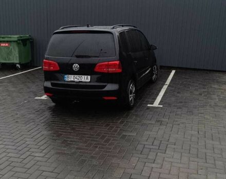 Черный Фольксваген Туран, объемом двигателя 1.4 л и пробегом 200 тыс. км за 10500 $, фото 7 на Automoto.ua