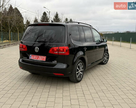 Черный Фольксваген Туран, объемом двигателя 1.6 л и пробегом 211 тыс. км за 11300 $, фото 6 на Automoto.ua