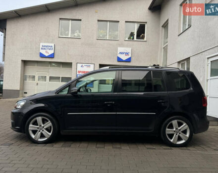 Черный Фольксваген Туран, объемом двигателя 1.4 л и пробегом 171 тыс. км за 10799 $, фото 1 на Automoto.ua