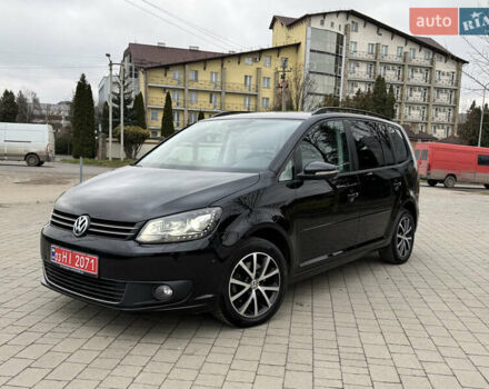 Черный Фольксваген Туран, объемом двигателя 1.6 л и пробегом 211 тыс. км за 11300 $, фото 1 на Automoto.ua