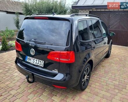 Черный Фольксваген Туран, объемом двигателя 1.6 л и пробегом 204 тыс. км за 11950 $, фото 16 на Automoto.ua