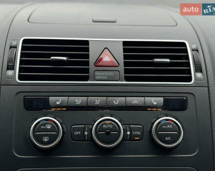 Черный Фольксваген Туран, объемом двигателя 1.4 л и пробегом 171 тыс. км за 10799 $, фото 31 на Automoto.ua