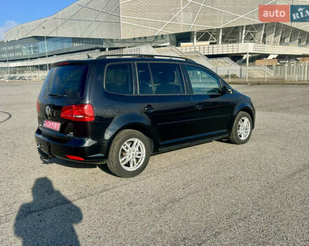 Черный Фольксваген Туран, объемом двигателя 1.6 л и пробегом 223 тыс. км за 11700 $, фото 7 на Automoto.ua