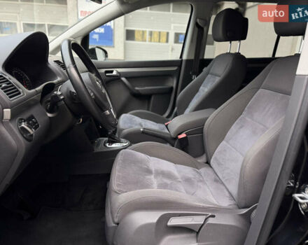 Черный Фольксваген Туран, объемом двигателя 1.4 л и пробегом 171 тыс. км за 10799 $, фото 5 на Automoto.ua