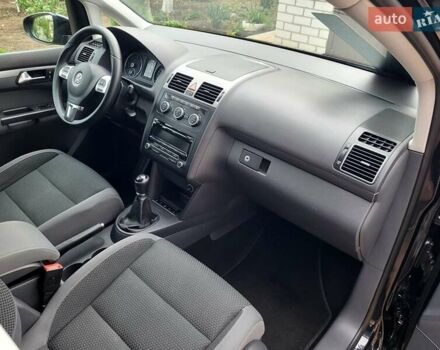 Черный Фольксваген Туран, объемом двигателя 1.6 л и пробегом 204 тыс. км за 11950 $, фото 68 на Automoto.ua