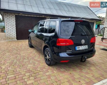 Черный Фольксваген Туран, объемом двигателя 1.6 л и пробегом 204 тыс. км за 11950 $, фото 12 на Automoto.ua