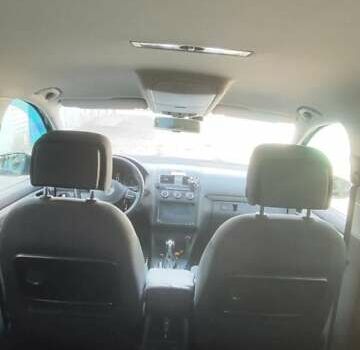 Черный Фольксваген Туран, объемом двигателя 2 л и пробегом 234 тыс. км за 12400 $, фото 1 на Automoto.ua