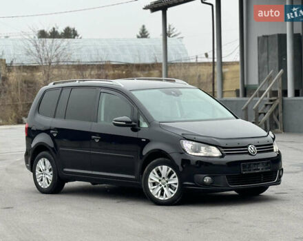 Чорний Фольксваген Туран, об'ємом двигуна 1.97 л та пробігом 243 тис. км за 12550 $, фото 1 на Automoto.ua