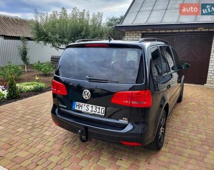 Черный Фольксваген Туран, объемом двигателя 1.6 л и пробегом 204 тыс. км за 11950 $, фото 15 на Automoto.ua