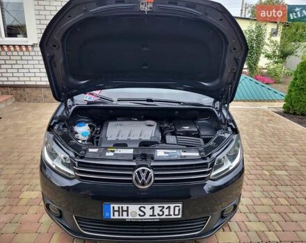 Черный Фольксваген Туран, объемом двигателя 1.6 л и пробегом 204 тыс. км за 11950 $, фото 87 на Automoto.ua
