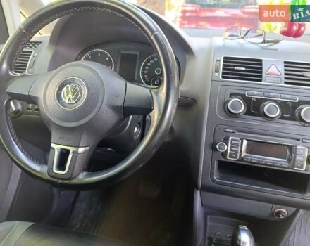 Черный Фольксваген Туран, объемом двигателя 1.6 л и пробегом 267 тыс. км за 11700 $, фото 2 на Automoto.ua