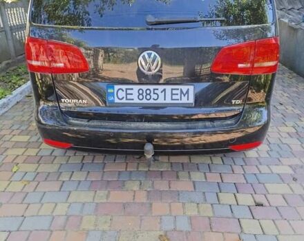 Черный Фольксваген Туран, объемом двигателя 1.6 л и пробегом 267 тыс. км за 11700 $, фото 1 на Automoto.ua