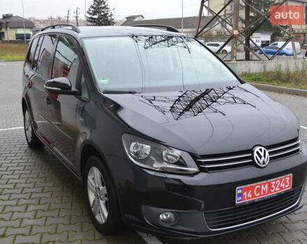 Черный Фольксваген Туран, объемом двигателя 2 л и пробегом 230 тыс. км за 14200 $, фото 1 на Automoto.ua