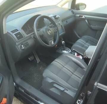 Черный Фольксваген Туран, объемом двигателя 2 л и пробегом 234 тыс. км за 12400 $, фото 3 на Automoto.ua