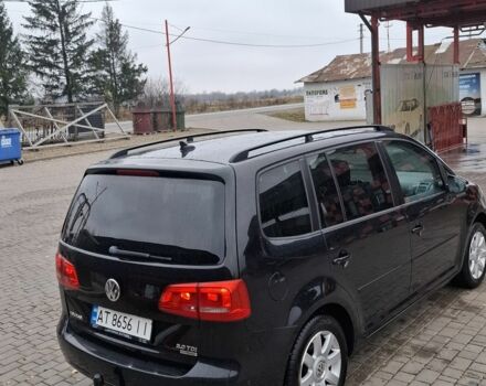 Черный Фольксваген Туран, объемом двигателя 2 л и пробегом 23 тыс. км за 14233 $, фото 1 на Automoto.ua