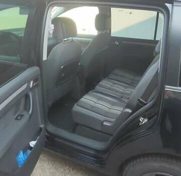 Черный Фольксваген Туран, объемом двигателя 2 л и пробегом 234 тыс. км за 12400 $, фото 2 на Automoto.ua