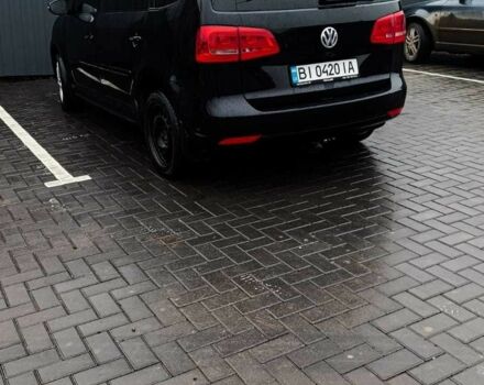 Черный Фольксваген Туран, объемом двигателя 1.4 л и пробегом 200 тыс. км за 10500 $, фото 3 на Automoto.ua