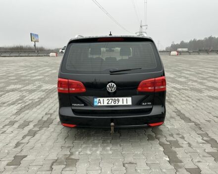 Черный Фольксваген Туран, объемом двигателя 2 л и пробегом 340 тыс. км за 9000 $, фото 1 на Automoto.ua