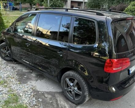 Черный Фольксваген Туран, объемом двигателя 1.4 л и пробегом 224 тыс. км за 9990 $, фото 1 на Automoto.ua