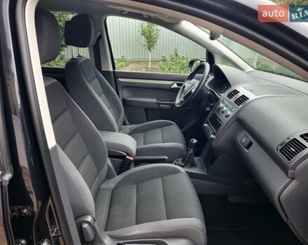 Черный Фольксваген Туран, объемом двигателя 1.6 л и пробегом 204 тыс. км за 11950 $, фото 70 на Automoto.ua