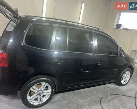 Черный Фольксваген Туран, объемом двигателя 1.97 л и пробегом 299 тыс. км за 11200 $, фото 6 на Automoto.ua