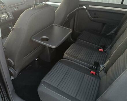 Черный Фольксваген Туран, объемом двигателя 1.6 л и пробегом 211 тыс. км за 12800 $, фото 1 на Automoto.ua