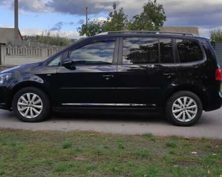 Черный Фольксваген Туран, объемом двигателя 1.97 л и пробегом 349 тыс. км за 13300 $, фото 9 на Automoto.ua