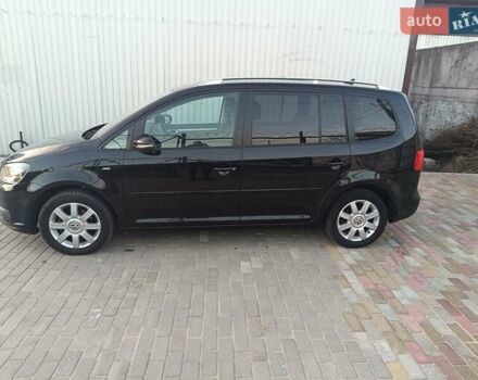 Черный Фольксваген Туран, объемом двигателя 1.6 л и пробегом 211 тыс. км за 12800 $, фото 5 на Automoto.ua