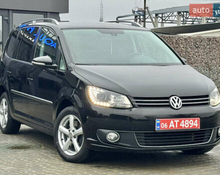 Черный Фольксваген Туран, объемом двигателя 2 л и пробегом 196 тыс. км за 14599 $, фото 1 на Automoto.ua