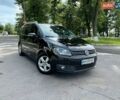 Черный Фольксваген Туран, объемом двигателя 1.6 л и пробегом 228 тыс. км за 10900 $, фото 1 на Automoto.ua