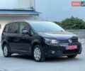 Черный Фольксваген Туран, объемом двигателя 1.6 л и пробегом 230 тыс. км за 12999 $, фото 1 на Automoto.ua