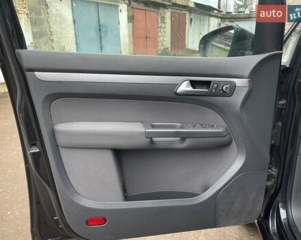 Черный Фольксваген Туран, объемом двигателя 1.4 л и пробегом 207 тыс. км за 10777 $, фото 35 на Automoto.ua