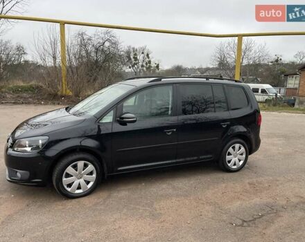 Черный Фольксваген Туран, объемом двигателя 1.4 л и пробегом 207 тыс. км за 10777 $, фото 111 на Automoto.ua