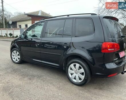 Черный Фольксваген Туран, объемом двигателя 1.4 л и пробегом 207 тыс. км за 10777 $, фото 177 на Automoto.ua