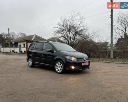 Черный Фольксваген Туран, объемом двигателя 1.4 л и пробегом 207 тыс. км за 10777 $, фото 118 на Automoto.ua