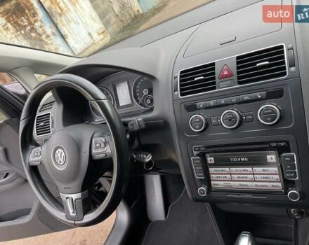 Черный Фольксваген Туран, объемом двигателя 1.4 л и пробегом 207 тыс. км за 10777 $, фото 48 на Automoto.ua