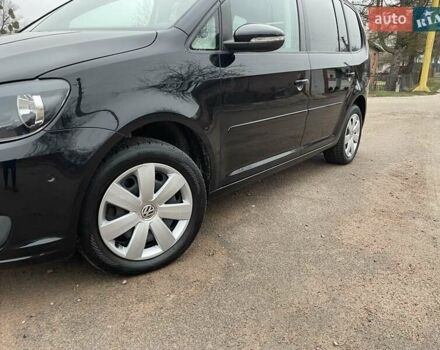 Черный Фольксваген Туран, объемом двигателя 1.4 л и пробегом 207 тыс. км за 10777 $, фото 108 на Automoto.ua