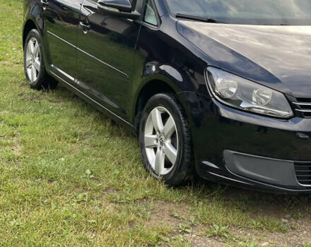 Чорний Фольксваген Туран, об'ємом двигуна 1.6 л та пробігом 253 тис. км за 12700 $, фото 4 на Automoto.ua