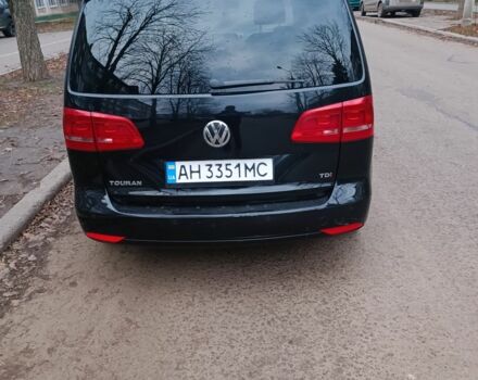 Черный Фольксваген Туран, объемом двигателя 1.6 л и пробегом 293 тыс. км за 10500 $, фото 1 на Automoto.ua
