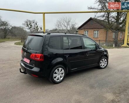 Черный Фольксваген Туран, объемом двигателя 1.4 л и пробегом 207 тыс. км за 10777 $, фото 184 на Automoto.ua