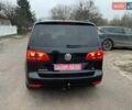 Черный Фольксваген Туран, объемом двигателя 1.4 л и пробегом 207 тыс. км за 10777 $, фото 4 на Automoto.ua
