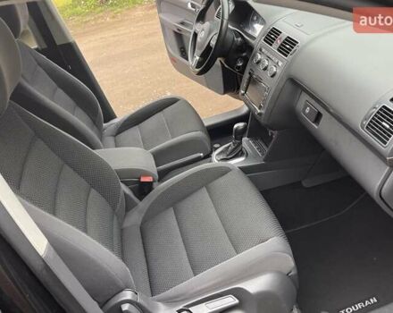 Черный Фольксваген Туран, объемом двигателя 1.4 л и пробегом 207 тыс. км за 10777 $, фото 201 на Automoto.ua