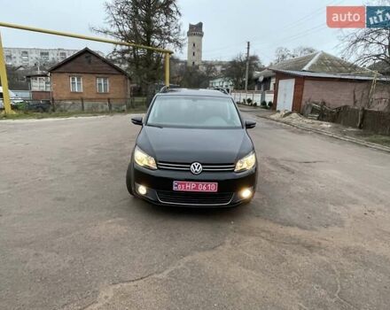 Черный Фольксваген Туран, объемом двигателя 1.4 л и пробегом 207 тыс. км за 10777 $, фото 106 на Automoto.ua