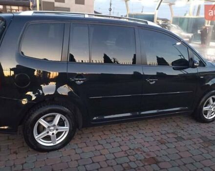 Черный Фольксваген Туран, объемом двигателя 1.6 л и пробегом 165 тыс. км за 13250 $, фото 53 на Automoto.ua