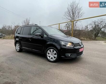Черный Фольксваген Туран, объемом двигателя 1.4 л и пробегом 207 тыс. км за 10777 $, фото 181 на Automoto.ua